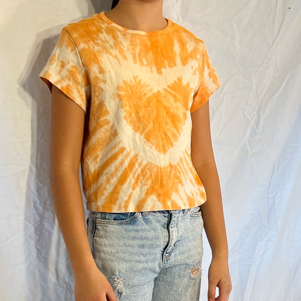 Orange tie dye crop top.